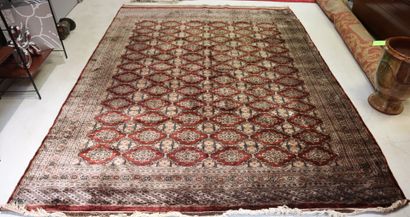 Wool carpet with brown background. 295 x...