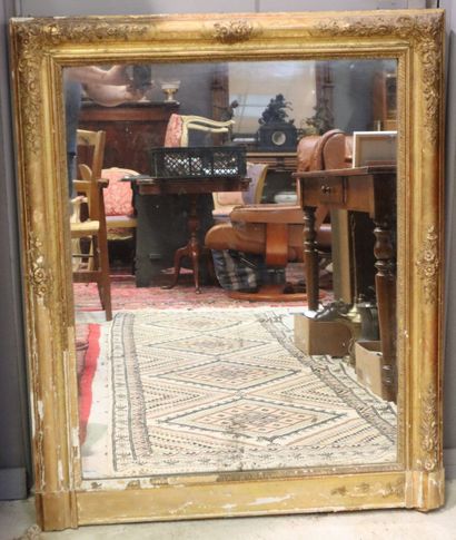 Rectangular glass, gilded frame with palmettes....