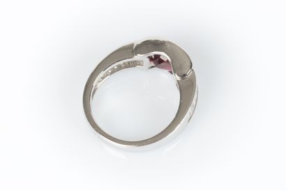 White gold ring centered in a semi-circle...