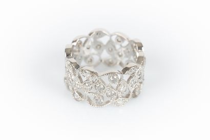 White gold ring with stylized foliage set...