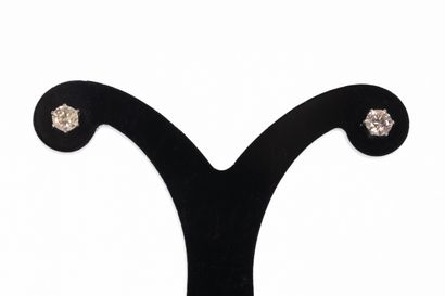 Pair of ear studs in white gold set with...