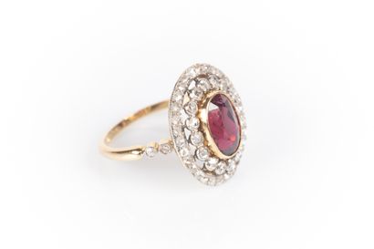 Two-tone gold daisy ring set with an oval...