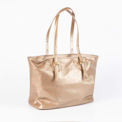 LONGCHAMP. Tote handbag in smooth gold leather....