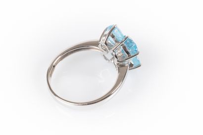 White gold flower ring set with a diamond...