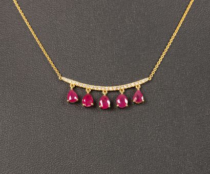 Yellow gold drapery necklace adorned with...