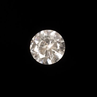 Platinum ring set with a brilliant-cut diamond...