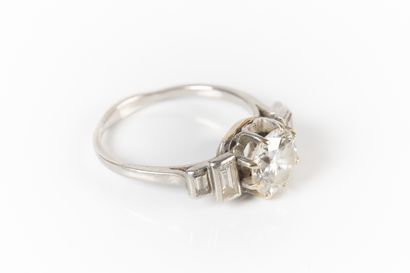Platinum ring set with a brilliant-cut diamond...