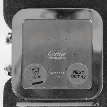 CARTIER. Pendulette réveil de voyage en acier,...