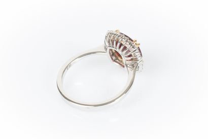 Two-tone gold ring set with a cushion-shaped...
