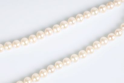 Natural cultured pearl necklace. Average...