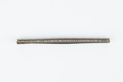 Barrette brooch set with 21 round-cut diamonds....