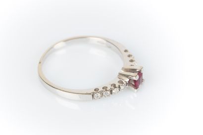 White gold ring set with a square-cut ruby...