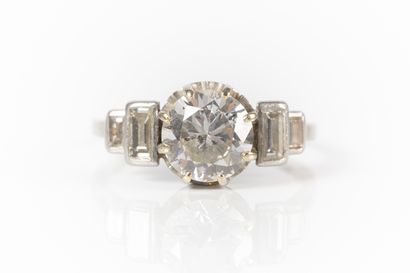 Platinum ring set with a brilliant-cut diamond...