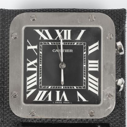 CARTIER. Pendulette réveil de voyage en acier,...
