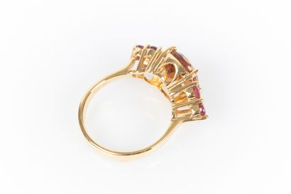 Yellow gold ring set with an oval-cut Citrine...
