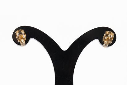 Pair of ear studs, each stud set with an...