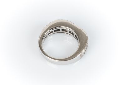 White gold ring set with 9 princess-cut diamonds...
