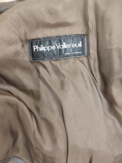 Philippe VALLEREUIL. Brown leather coat....