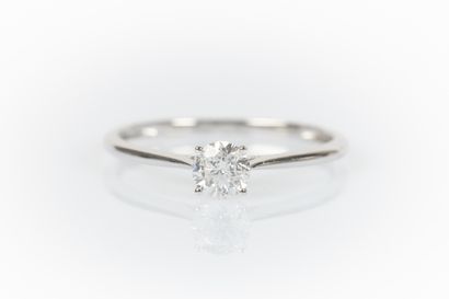 White gold solitaire set with a round diamond...