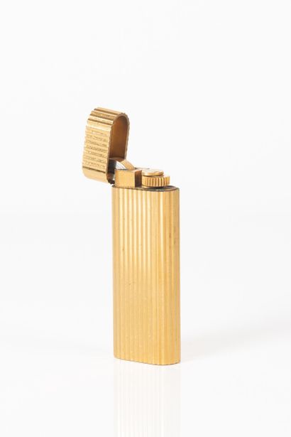 CARTIER. Gold-plated lighter 