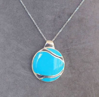 Sterling silver pendant set with a turquoise...