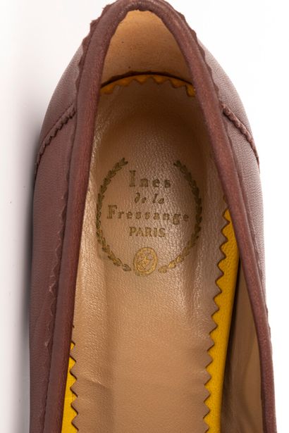 INES DE LA FRESSANGE. Pair of brown leather...