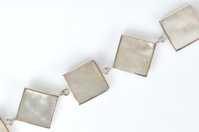 Silver bracelet with square design set with...