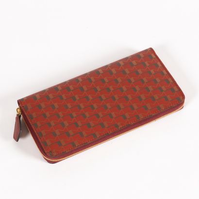 MOYNAT. Red and gold monogrammed coated textile...