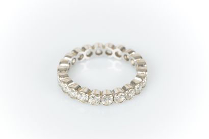 White gold wedding band set with white stones...