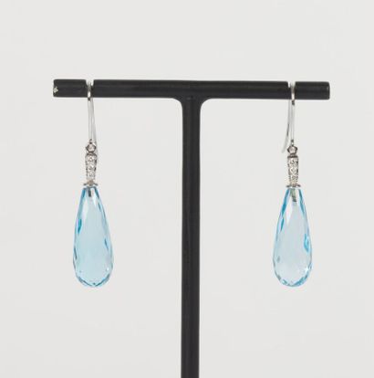 Pair of white gold earrings set with two...