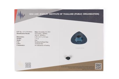 Sealed pear-shaped blue spinel with certificate...