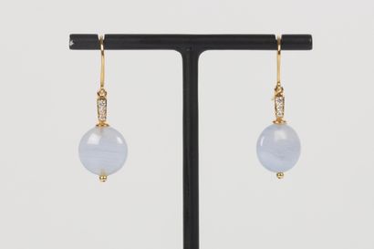 Pair of earrings in yellow gold adorned with...