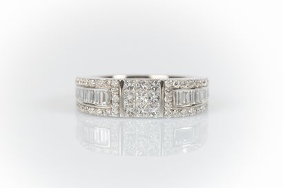 White gold ring set with 9 princess-cut diamonds...