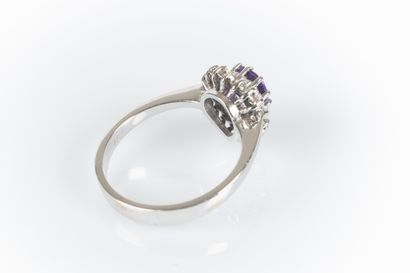 White gold ring set with a pear-shaped amethyst...