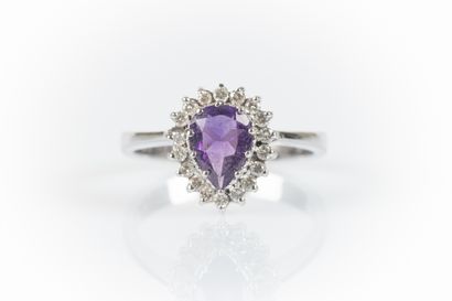 White gold ring set with a pear-shaped amethyst...