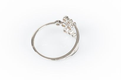 White gold ring set with 9 round diamonds....
