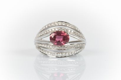White gold ring set with an oval pink tourmaline...