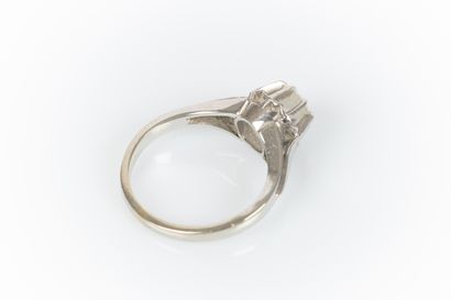 Gold and platinum solitaire ring set with...
