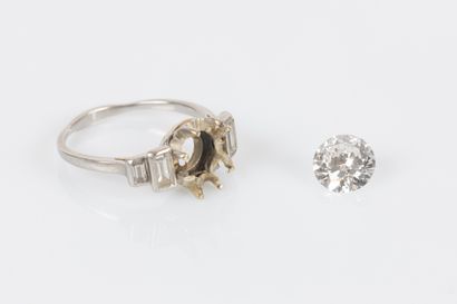 Platinum ring set with a brilliant-cut diamond...