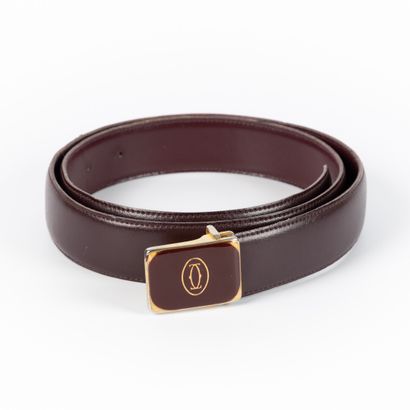 CARTIER. Belt in smooth burgundy leather,...
