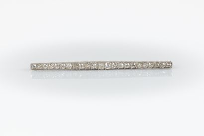 Barrette brooch set with 21 round-cut diamonds....