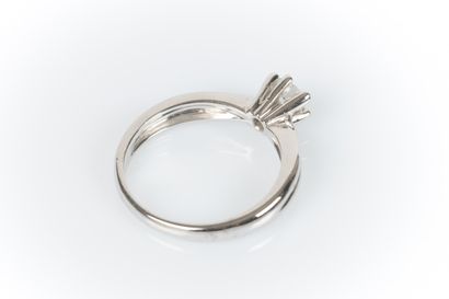 White gold solitaire set with a modern round...