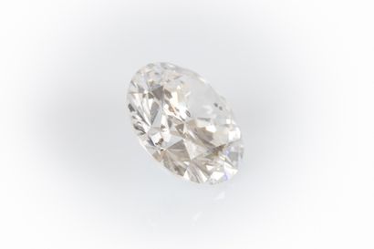 Platinum ring set with a brilliant-cut diamond...