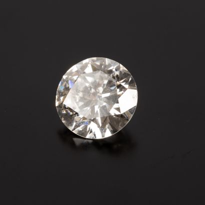 Platinum ring set with a brilliant-cut diamond...