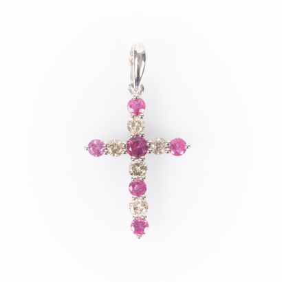 White gold cross set with 6 round rubies...