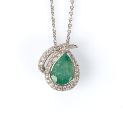 White gold pendant in a stylized setting...