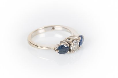 White gold ring set with a round diamond...