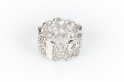 White gold ring with stylized foliage set...