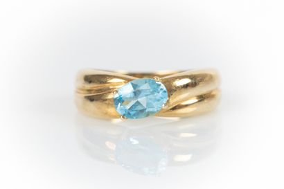 Yellow gold ring with two crossed wedding...