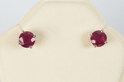 Pair of white gold earrings set with 4 claws...